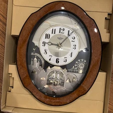 Rhythm Small World Woodgrain Moving Wall Clock 4MH752 Works Multiple Melodies