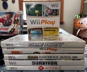 Nintendo Wii Console with Controllers, NHL Snapshot Game plus 2 Sticks, BONUS