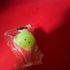 Green Squishy Squeezable Stress Reliever Sensory Toy in Clear Wrapper