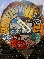 NEW CAR LICENSE PLATE “ FAKE “. 8” IN. CLOCK WOODEN COLORFUL DESIGN