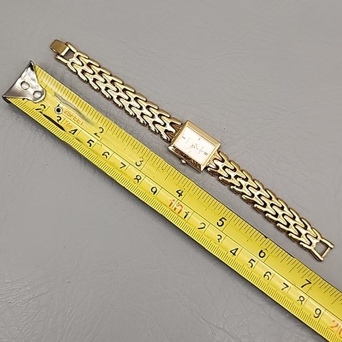 Reloj Peugeot Mujer Cuarzo Tono Dorado Funcionando 6.5" - Imagen 13 de 15