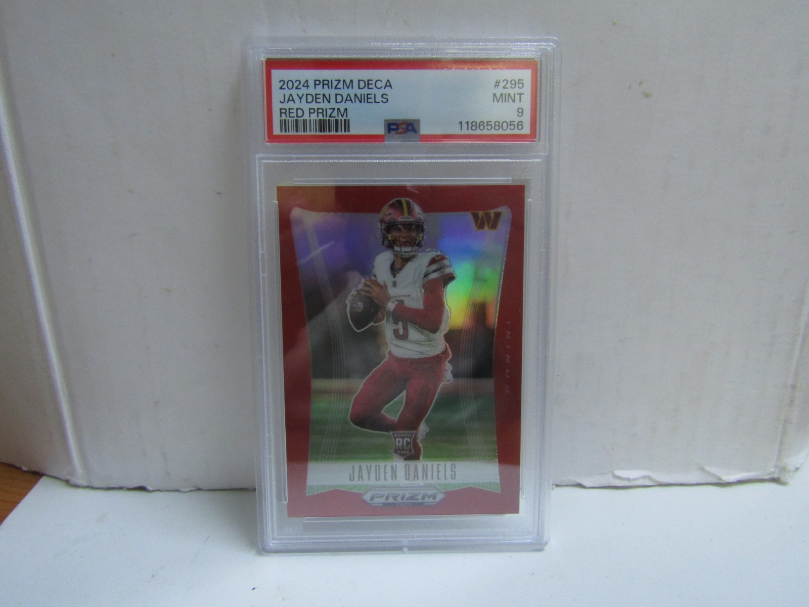 PSA 9 2024 Prizm Deca #295 Jayden Daniels Red Prizm RC /199 Commanders