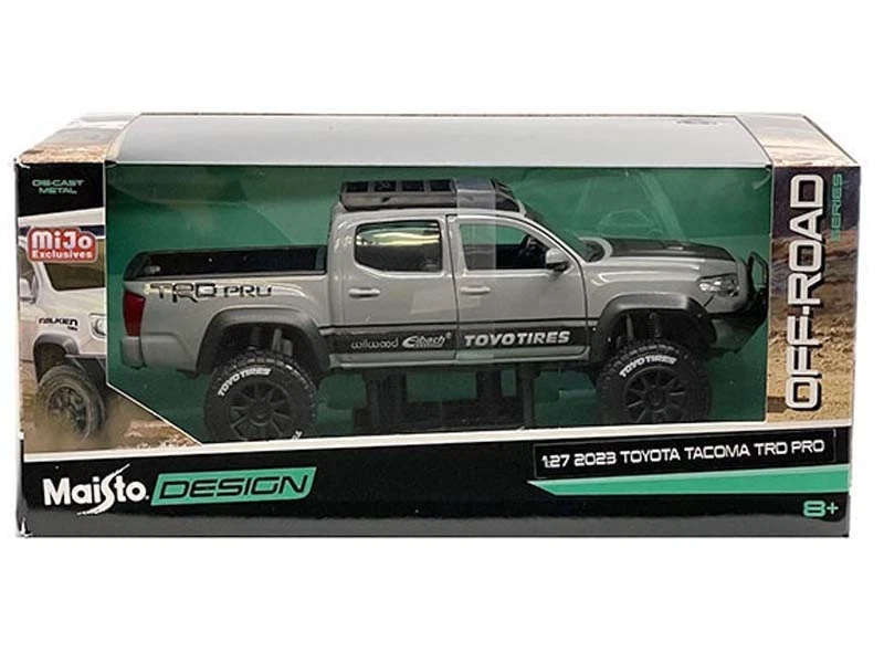 Toyota Tacoma TRD 2023 todo terreno neumáticos Toyo modelo escala 1:24 - Maisto 32458WH Foto 3 de 3