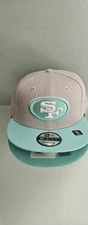 San Francisco 49ers New Era Snapback Cap.  Light Gray With Aqua Accents