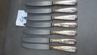 C2. Lot of 7 CHRISTOFLE silver metal table knives to identify.