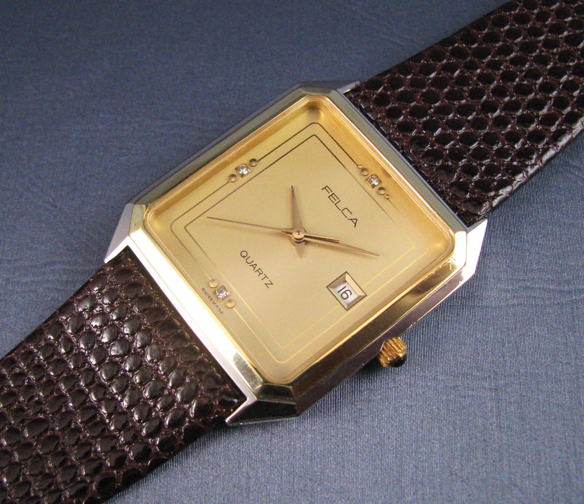 Vintage Felca Swiss Stainless Steel and Gold Tone Quartz Vintage Felca Swiss Stainless Steel and Gold Tone Quartz