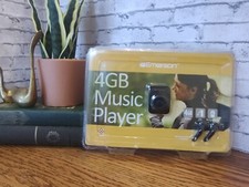 Emerson 4GB Music Player With Earbuds Sealed New