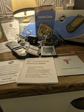 2 Palm Handheld.Preowned M105 Handheld And Tungsten E 2 Power Cords Books Cds...
