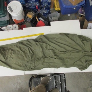 WW11 SLEEPING BAG WITH ISSUE CANVAS COVER.