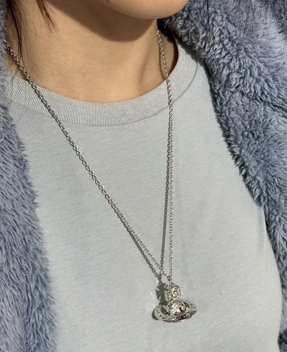 New~Vivienne Westwood Judy Orb With Moon And Starts Pendant New~Vivienne Westwood Judy Orb With Moon And Starts Pendant