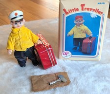Vintage Little Traveller Wind Up Tin Toy Figure