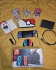 Nintendo Switch Boxed With Stand, 3 Ganes And Accessories.