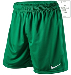 green nike football shorts