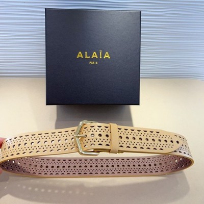 ALAIA's signature openwork design on its waist belt