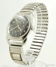 Bulova wrist watch, 17 jewels, thin SS WR case, Canadian dial, calendar band