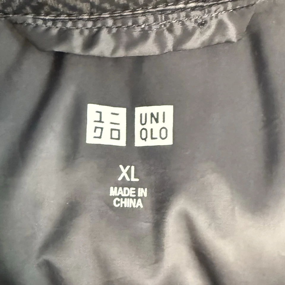 Chaqueta acolchada para mujer Uniqlo ultra ligera negra grande L larga doble cremallera Foto 3 de 4