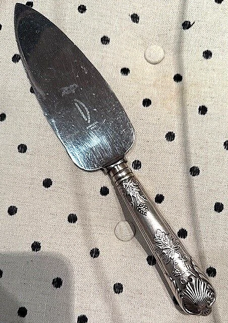 Vintage sterling cake/pie knife with serrated stainless blade