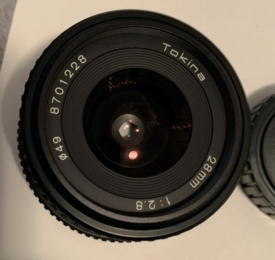Tokina 28mm f/2.8 lens.