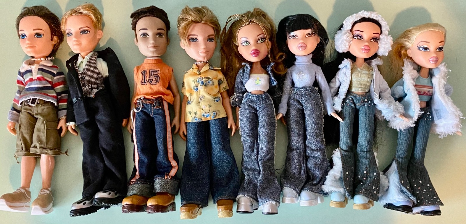 Lot of 8 BRATZ Dolls with Clothes and Shoes