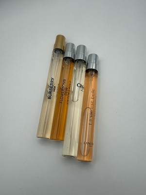 Bundle of 4 travel size perfume sprays Authentic Items Exactly As Pictured.