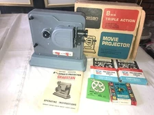 3916-1 CRAGSTAN 8mm Triple Action MOVIE PROJECTOR Battery Op w/ FILM & Box AS-IS