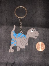 SILICONE DINOSAUR GRAY AND BLUE KEYCHAIN B 