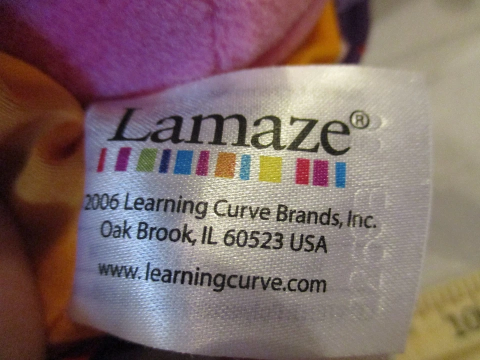 Juguete de peluche colgante Lamaze My Friend First Baby Doll Sonajero asiento de coche púrpura tulipán  Foto 3 de 4