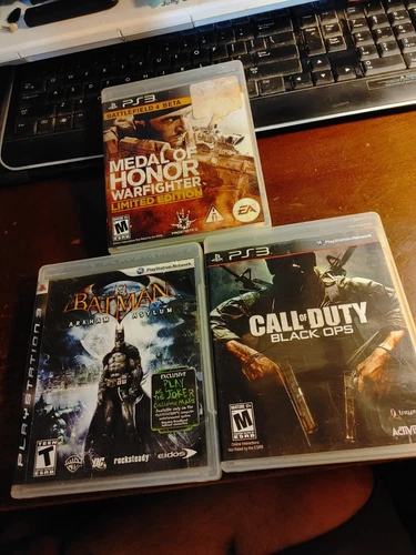 PS3 game Bundle Lot (3) Call of duty Black Ops Barman Arkham Medal Of Honor Disk