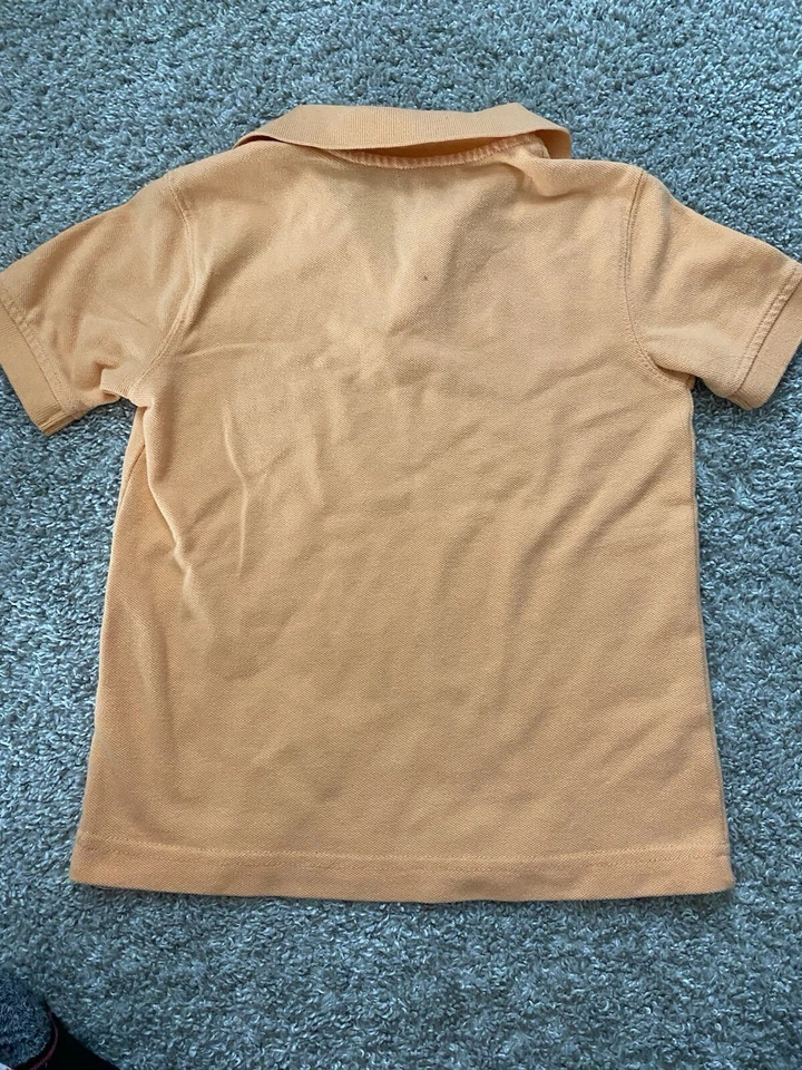Camiseta polo pulóver de manga corta naranja de mezcla de algodón para niños talla 4/5 Foto 2 de 3