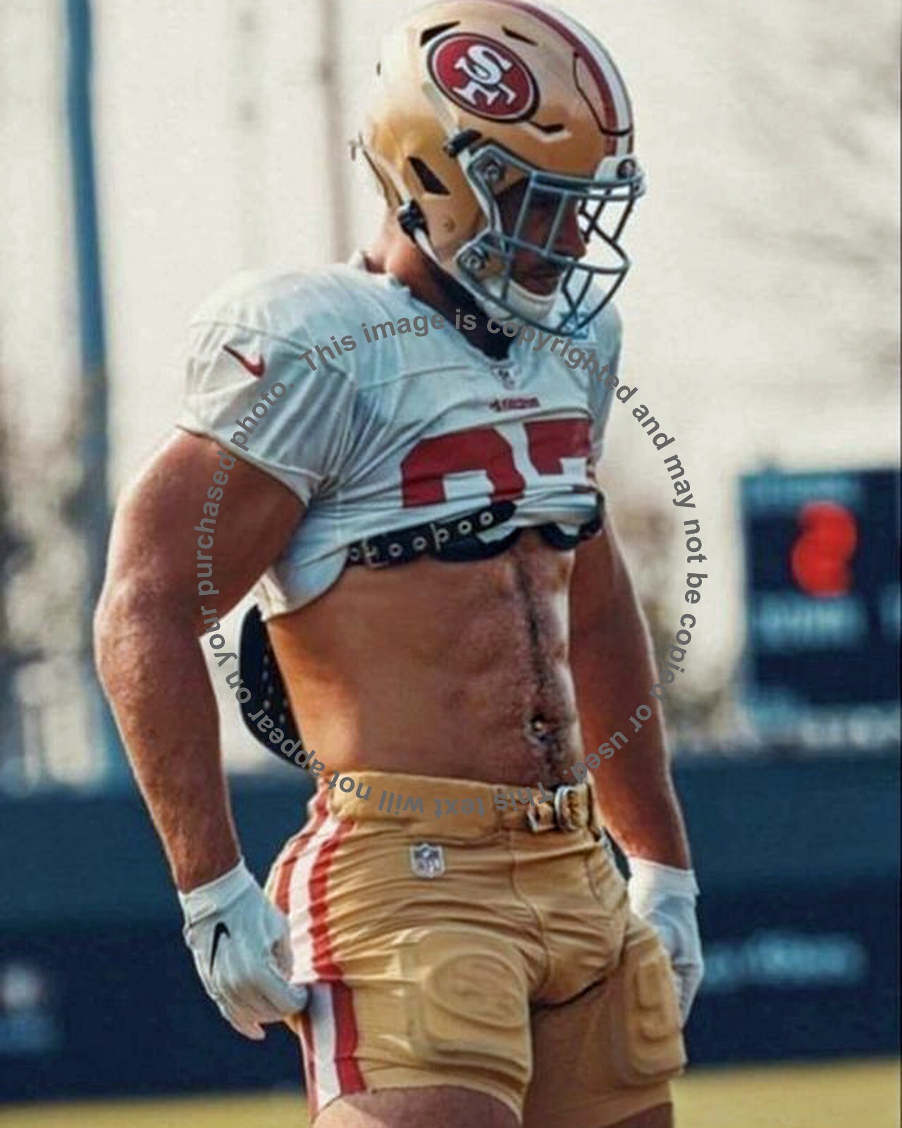 Football Player with his Jersey Rolled Up eBay