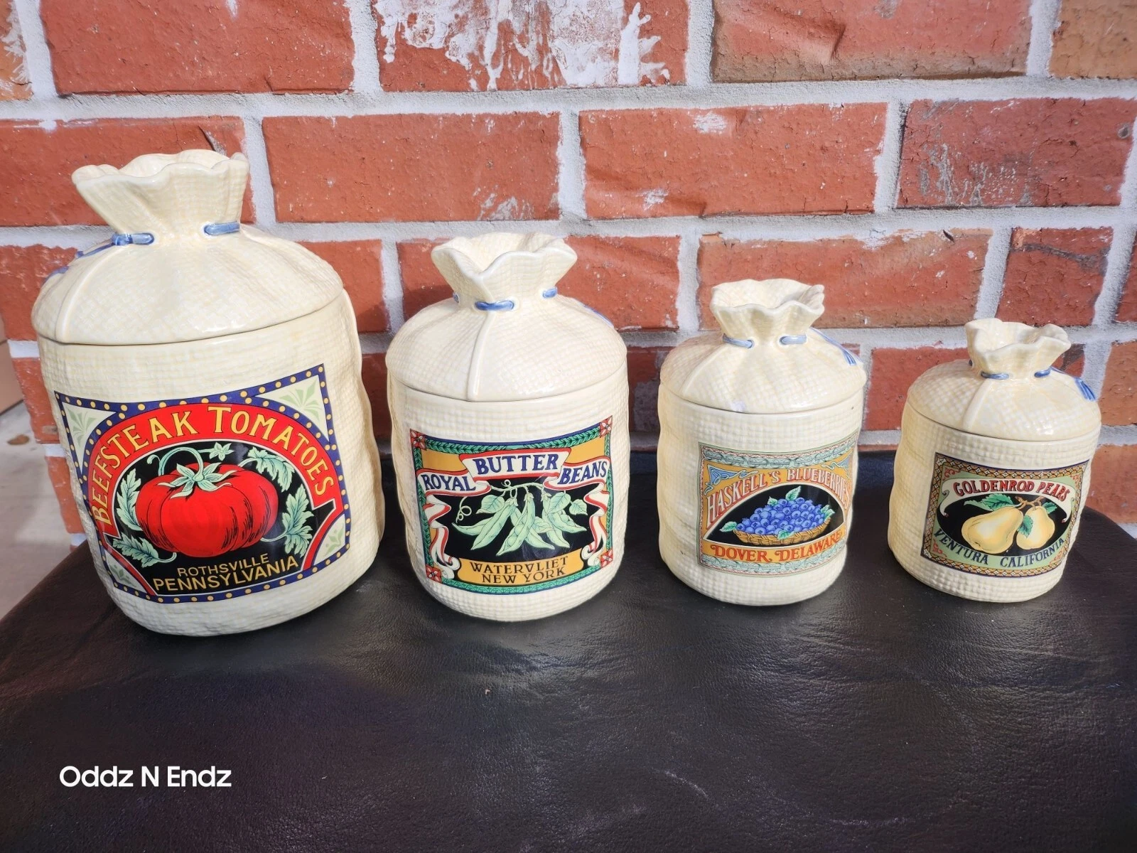 Set Of 4 Ceramic Food Canisters With Vintage Produce Labels & Lids