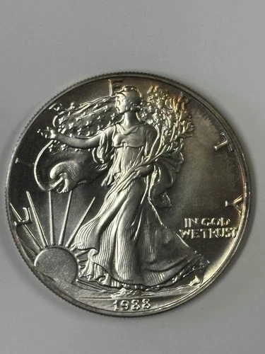 1988 American Silver Eagle Dollar 1 Troy Oz .999 Fine Silver.  Better Date
