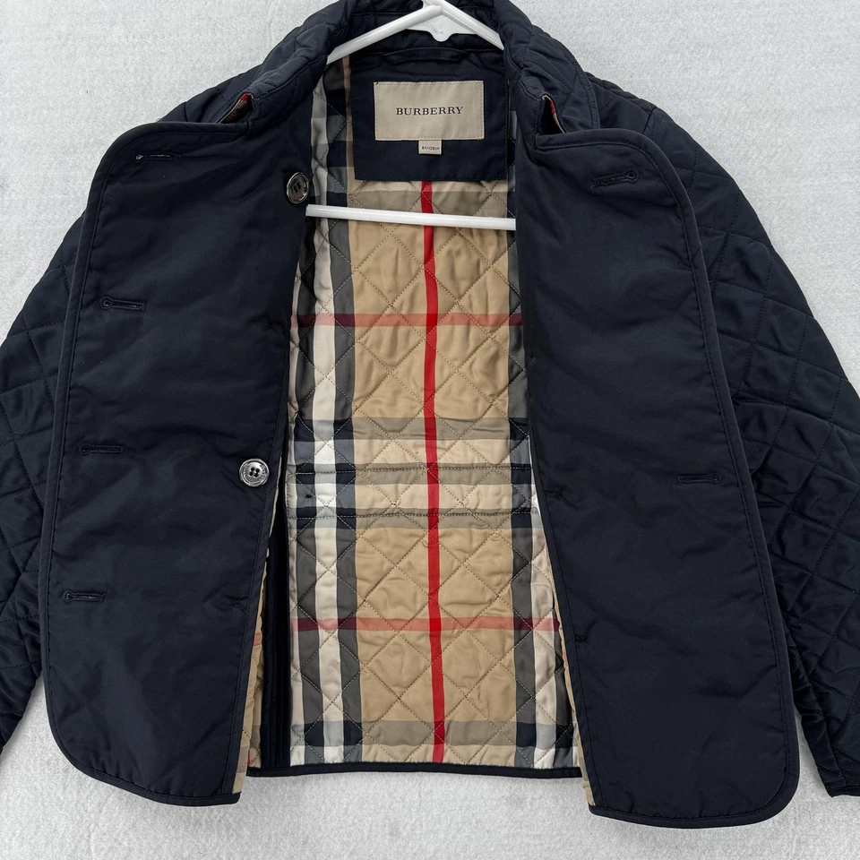 Jaqueta acolchoada Burberry Youth 8Y 128cm preta peito duplo forro Nova Check - Imagem 2 de 4