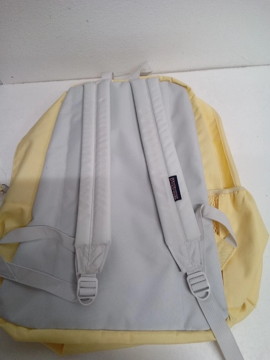 Pastel yellow jansport backpack cheap