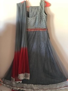 grey and red gown