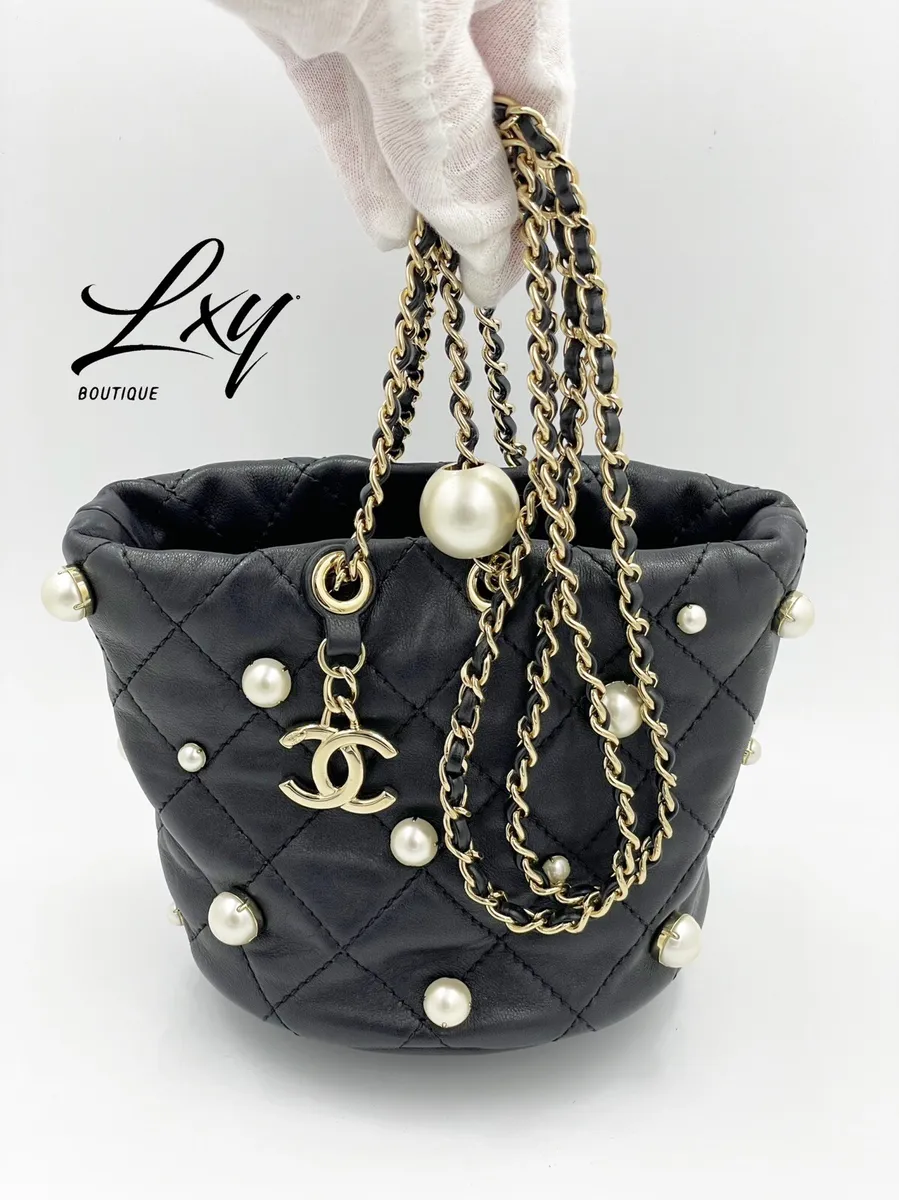 chanel quilted drawstring bag