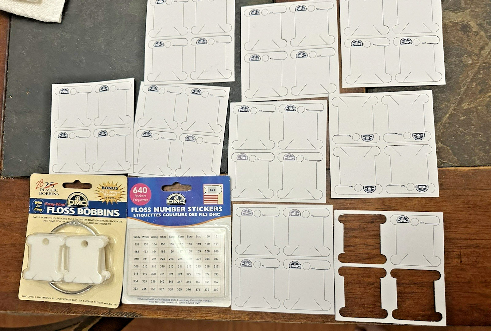 Lot of DMC Floss Number Stickers & plastic and paper Bobbins