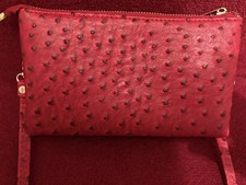 Unused ostrich effect red crossbody/clutch handbag with removable long strap