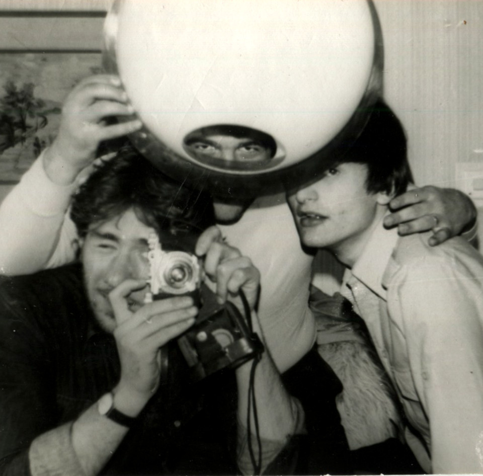 A genuine 1970s found-photo turned Space Age lamp prop — the kind of wonderfully odd vintage artifact that sparks a story every time someone notices it.