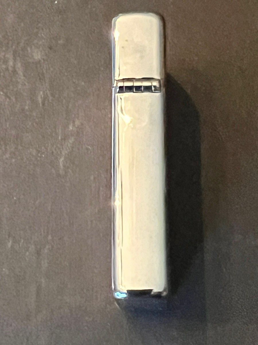 Vintage 1967 Zippo no. 1615 H.P. Ribbon Slim Lighter Vintage 1967 Zippo no. 1615 H.P. Ribbon Slim Lighter