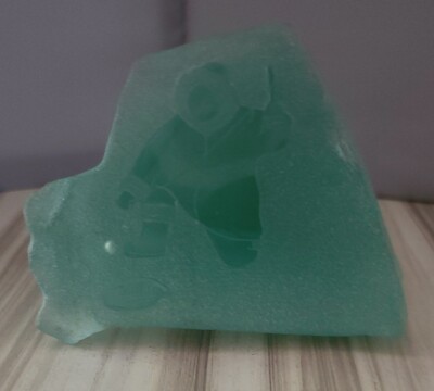 STUNNING INUIT ESKIMO GREEN GLASS CARVING MAN ICE FISHING