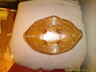 4 Footed 7-Inch Orange Marigold Carnival Glass Serving Bowl — photo 6