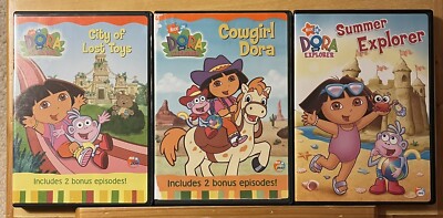 Lot of 3 DORA The Explorer DVDs (City Of Lost Toys,Cowgirl Dora
