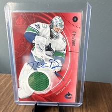 2025-26 Upper Deck SP Game Used Thatcher Demko Red Auto Jersey Canucks #51/149