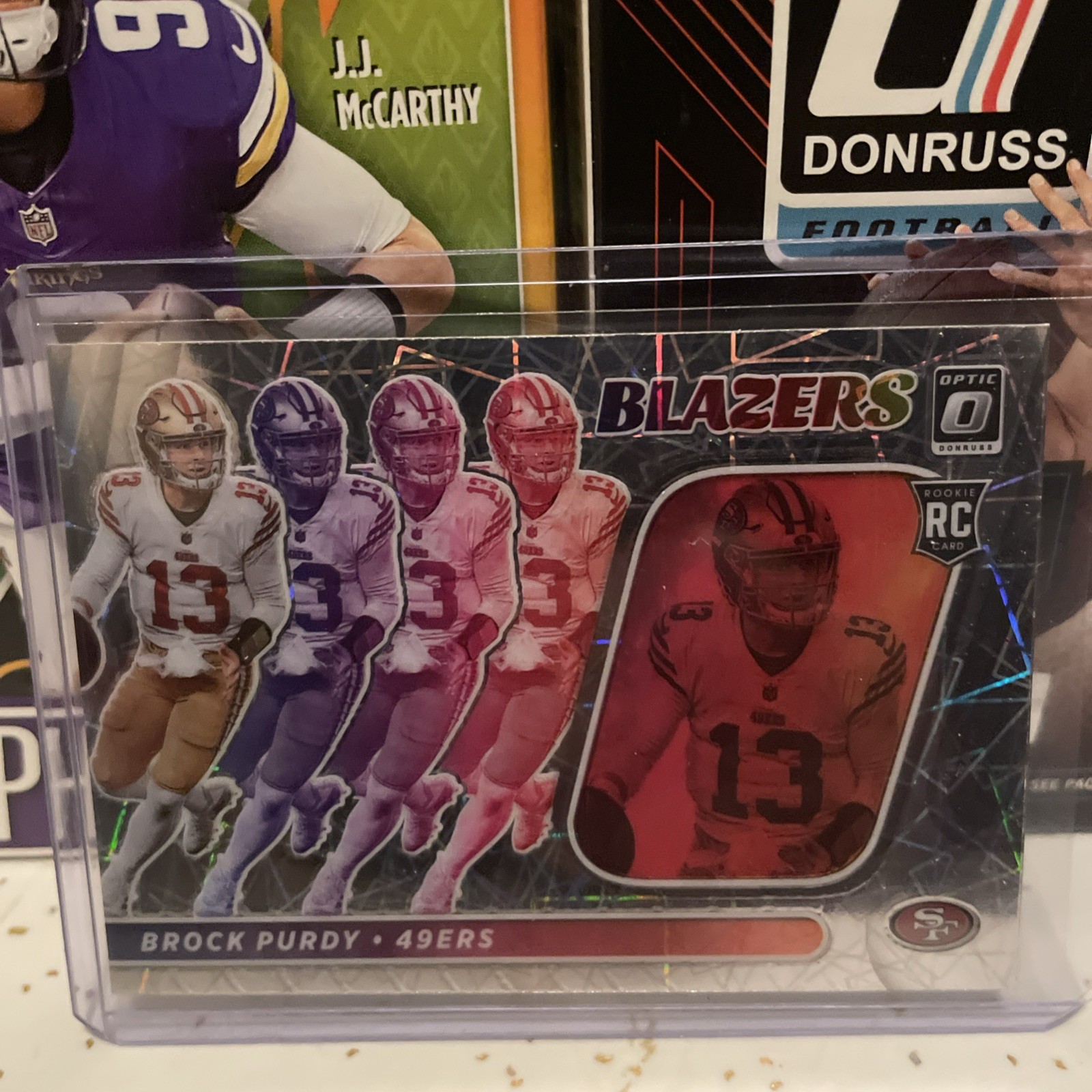 2022 Donruss Optic Brock Purdy Blazers SSP Case Hit RC Rookie B-15 Downtown Like