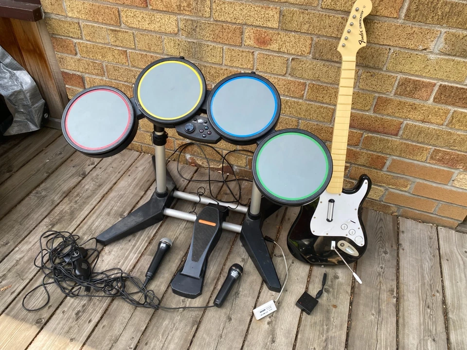 Rock Band Bundle PS3 Console, Wired Drums, Fender Stratocaster W/ Dongle, 2X Mic - Image 4 of 4