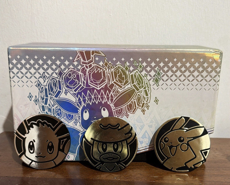 Pokémon TCG 3pc Plastic Embossed Coin Set Pikachu Eevee Gold Black 1.5" Box