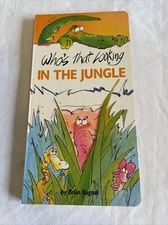 Peek a boo Board Books- Who's That Looking In The Jungle by Brian Bagnall B31