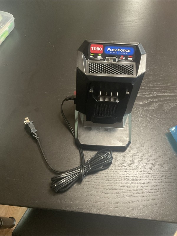 NEW Toro Lithium-Ion 60V MAX 2.5 Ah Battery (88625) and 60V Charger (88602)