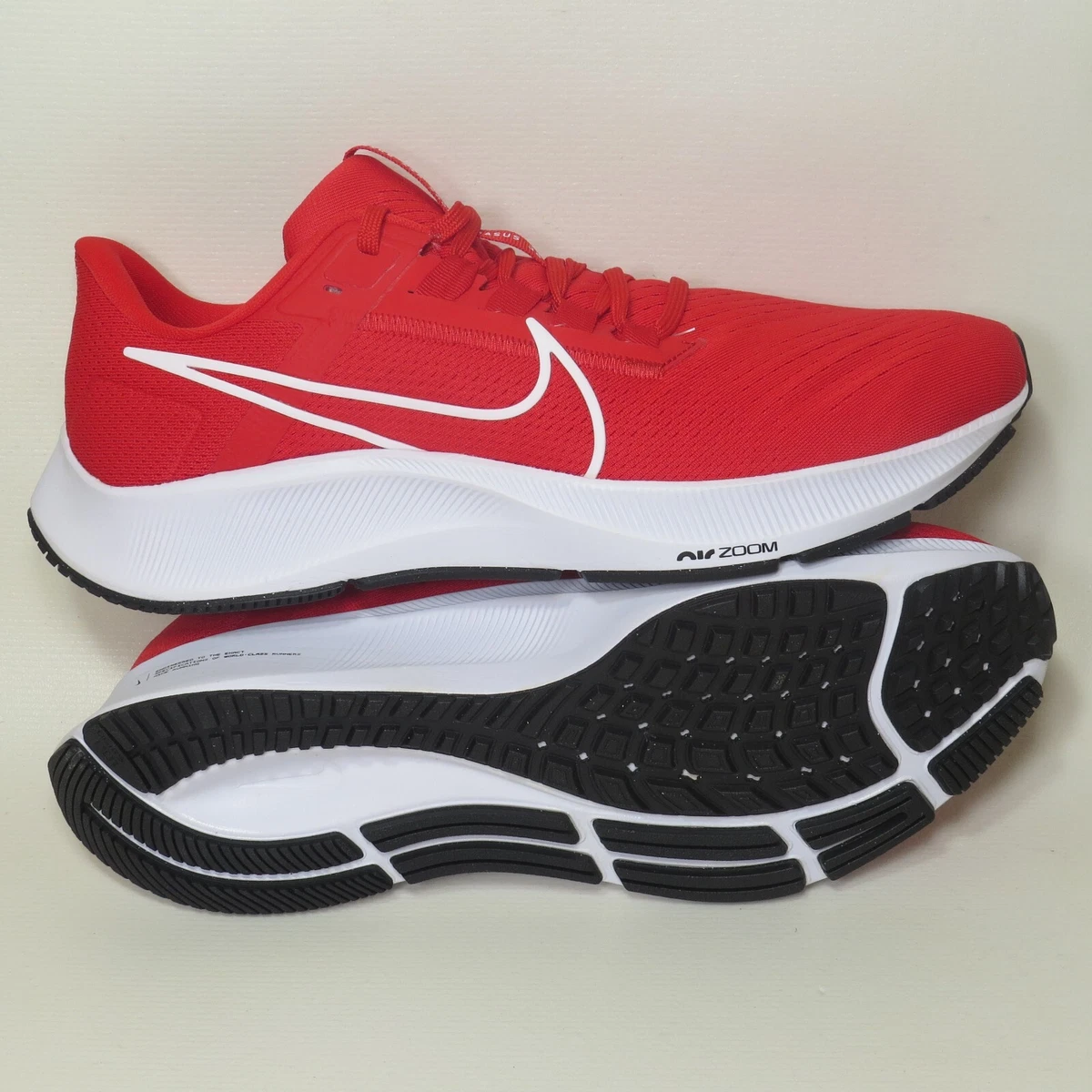 Red and white hotsell nike tennis shoes